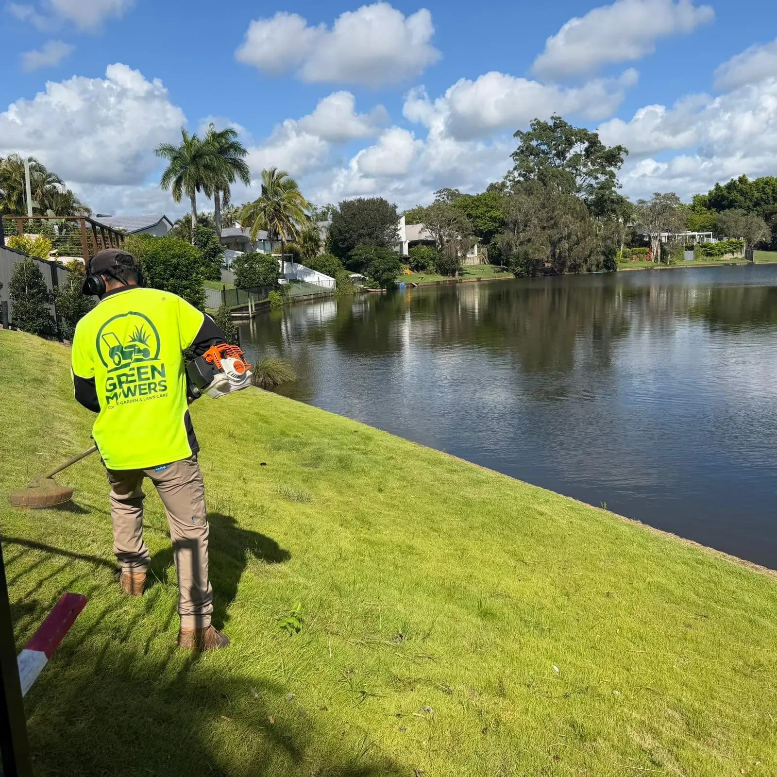 Green Mowers team member working at a Gold Coast property